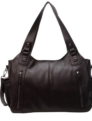 Brown leather hobo handbag with dual top handles, side zips, and shoulder strap