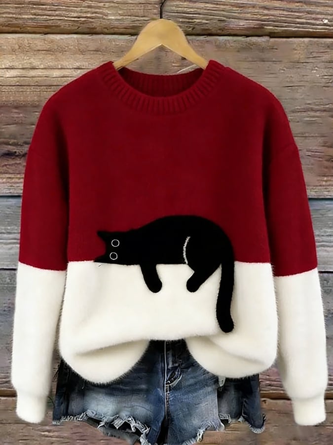 Red and white cat print sweatshirt with long sleeves and crew neck