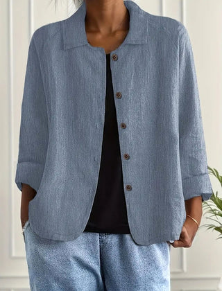 Wilhelmine blue crinkle-weave blouse with button-front placket and notch collar