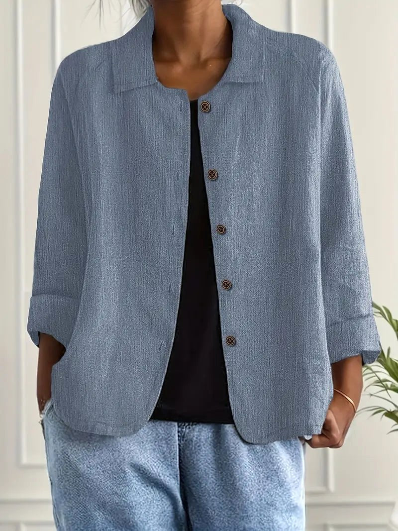 Wilhelmine blue crinkle-weave blouse with button-front placket and notch collar
