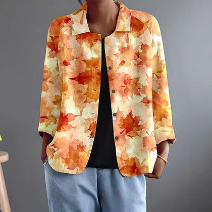 Watercolour leaf print button-up blouse in orange and cream, short sleeves and cuffs