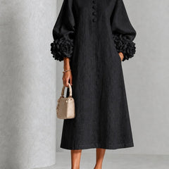 Black floral midi dress with button front and rose-cuff puff sleeves, full front view