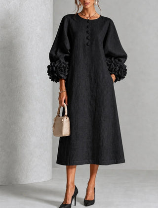 Black floral midi dress with button front and rose-cuff puff sleeves, full front view