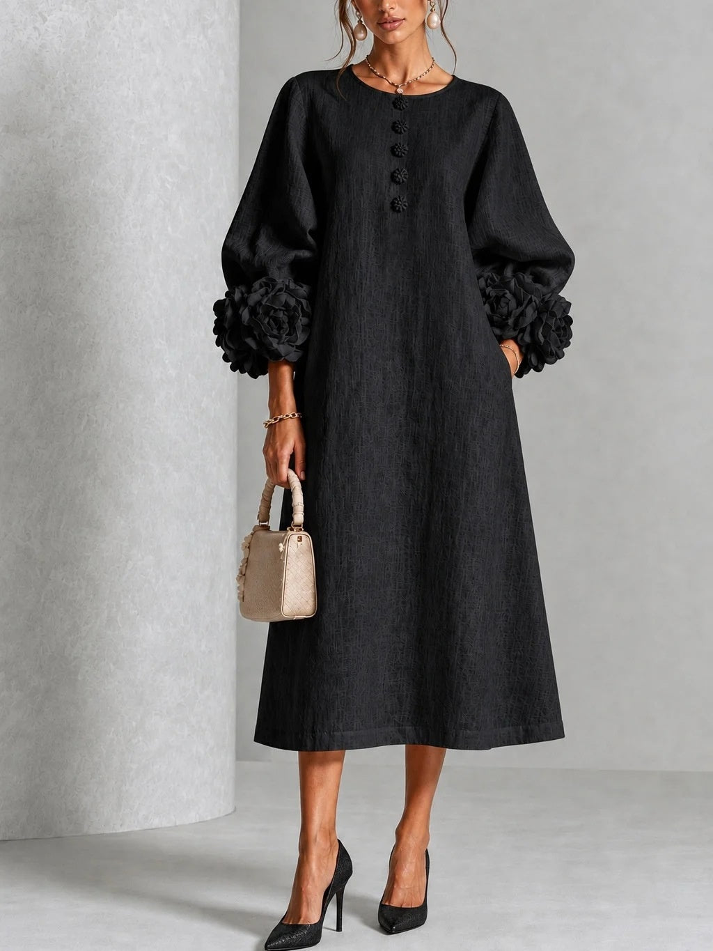 Black floral midi dress with button front and rose-cuff puff sleeves, full front view
