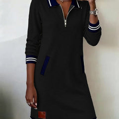 Black long-sleeve casual dress with half-zip collar, navy stripe cuffs and hem
