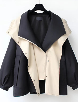 Black and beige windbreaker jacket with snap-front and contrast asym panels