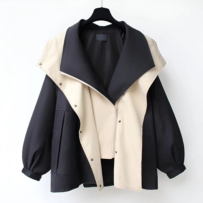 Black and beige windbreaker jacket with snap-front and contrast asym panels