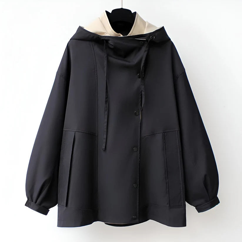 Black windbreaker jacket with snap-front, high collar, and side pockets