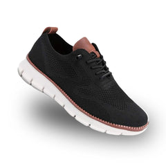 Black knit lace-up walker shoes with brown collar accents and white tread sole