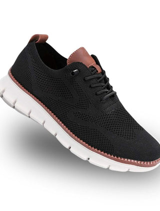 Black knit lace-up walker shoes with brown collar accents and white tread sole