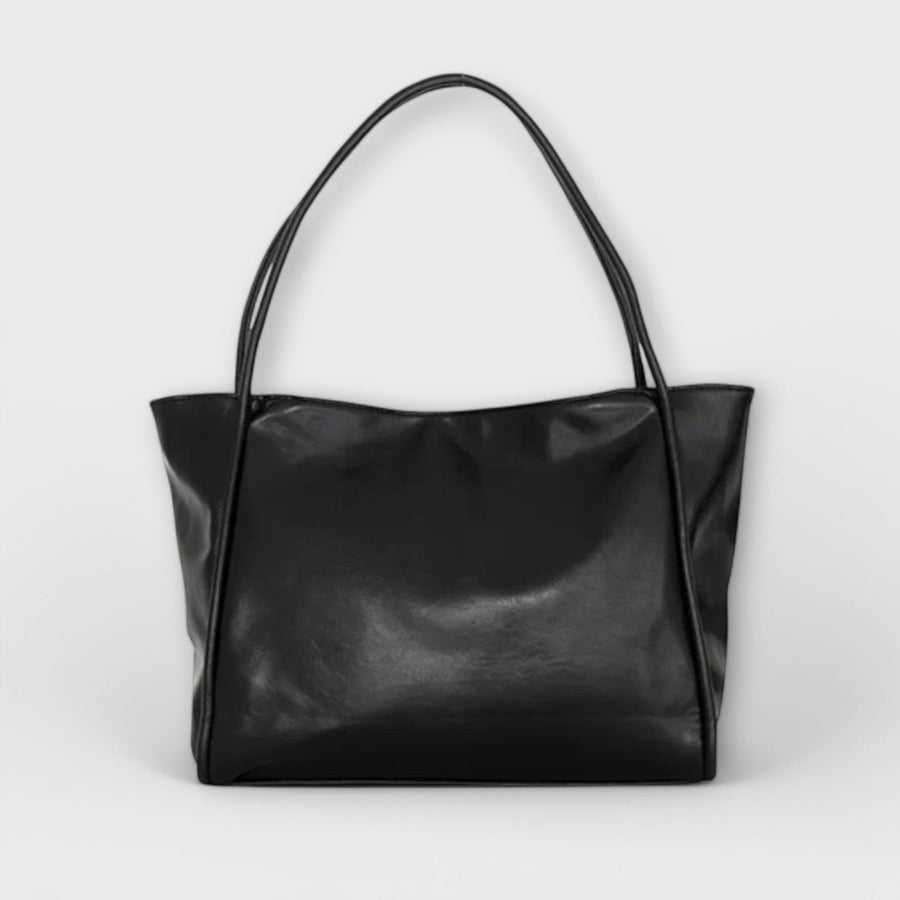 Black leather-look tote bag with wide top handles and structured rectangular body