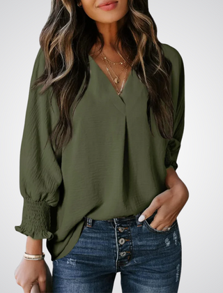 Olive green V-neck tunic blouse with button front and smocked long balloon sleeves