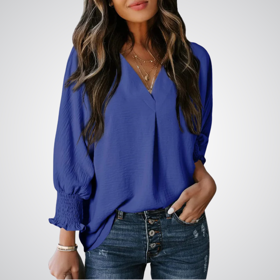 Royal blue V-neck tunic blouse with button front and smocked long balloon sleeves