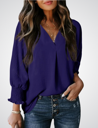 Deep purple V-neck tunic blouse with button front and smocked long balloon sleeves