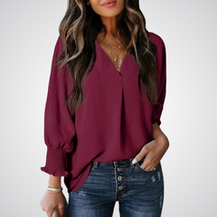 Burgundy V-neck tunic blouse with button front and smocked long balloon sleeves