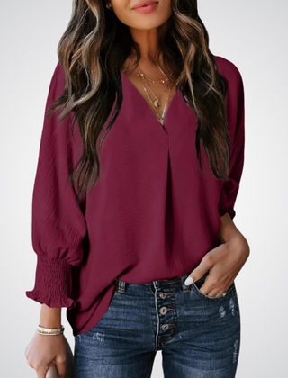 Burgundy V-neck tunic blouse with button front and smocked long balloon sleeves