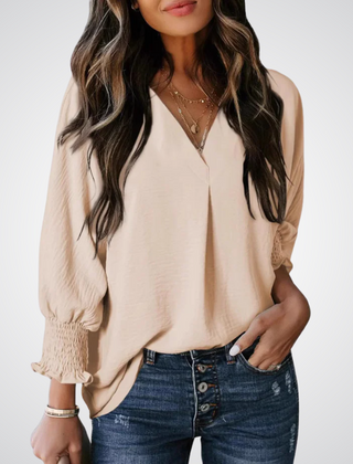 Beige V-neck tunic blouse with button front and smocked long balloon sleeves