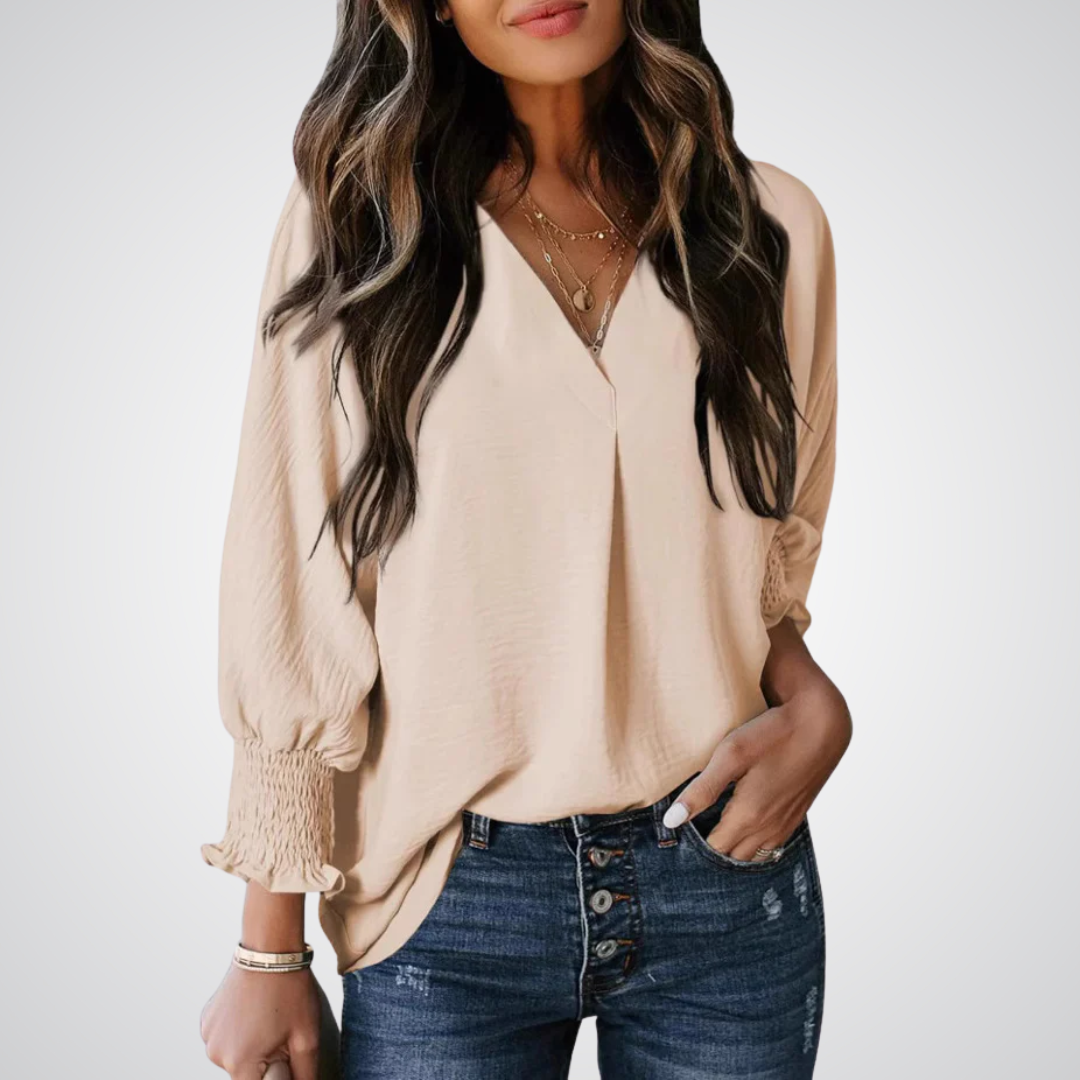 Beige V-neck tunic blouse with button front and smocked long balloon sleeves