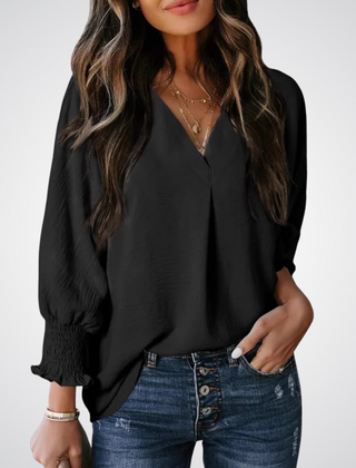 Black V-neck tunic blouse with button front and smocked long balloon sleeves