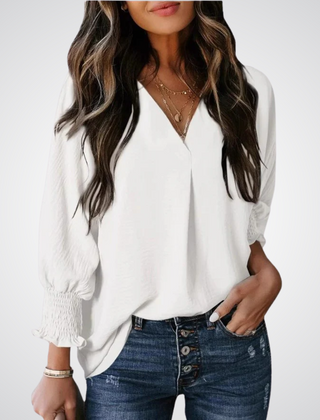 White V-neck tunic blouse with button front and smocked long balloon sleeves
