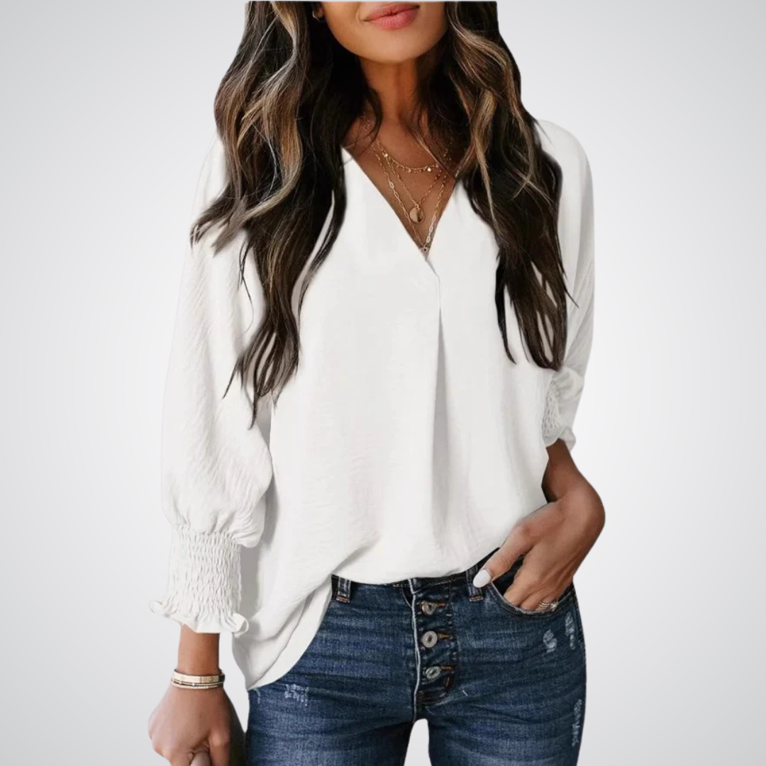 White V-neck tunic blouse with button front and smocked long balloon sleeves