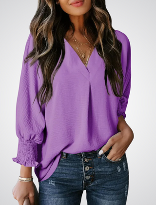 Lavender V-neck tunic blouse with button front and smocked long balloon sleeves