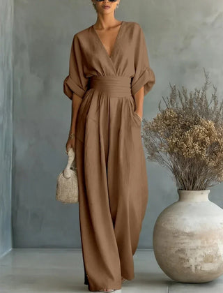 Taupe V-neck high-waisted jumpsuit with gathered waist and wide-leg long pants