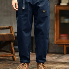 Navy blue cargo pants with thigh cargo pocket and cuffed ankle hem
