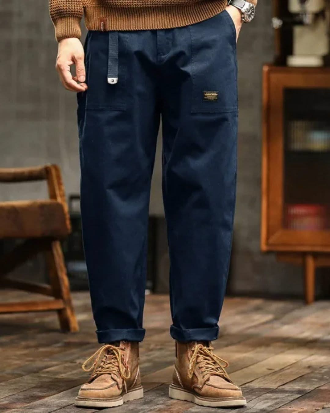 Navy blue cargo pants with thigh cargo pocket and cuffed ankle hem