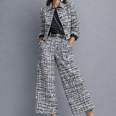 Tweed blazer and wide-leg trousers set in black-and-white with decorative gold belt