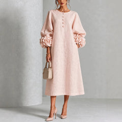 Pink floral midi dress with button front and rose-cuff puff sleeves
