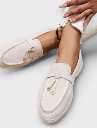 Women's suede loafers, off-white with bow and horsebit ornament, side view