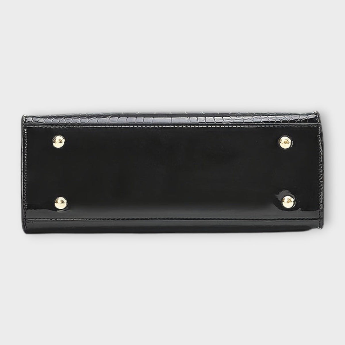 Shiny crocodile-pattern handbag base in black with four gold-tone feet