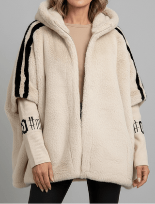 Cream hooded faux-fur jacket with black-and-white stripe sleeves and front zipper
