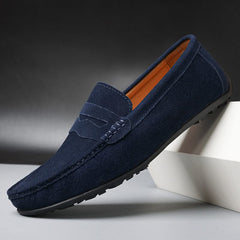 Suede loafers in navy with slip-on strap detail and stitched moc toe