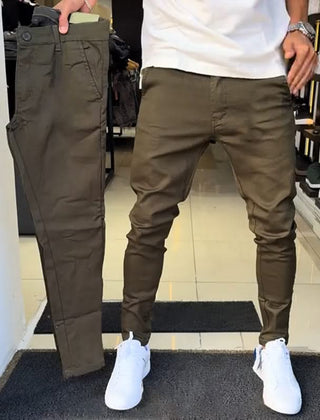 Olive khaki slim trousers with tapered legs, button waist, and side pockets