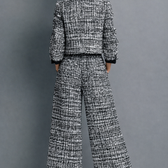 Women's black-and-white tweed blazer and wide-leg pants set, back view