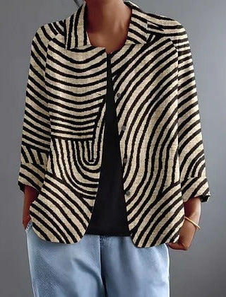 Curved stripe blouse with front pocket, black and brown striped pattern