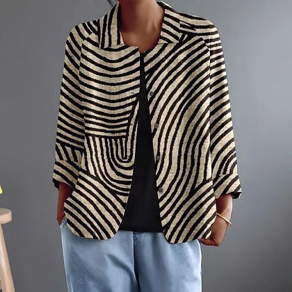 Curved stripe blouse with front pocket, black and brown striped pattern