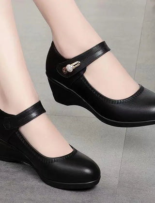 Black Mary Jane wedge heels, T-strap with decorative buckle on the instep