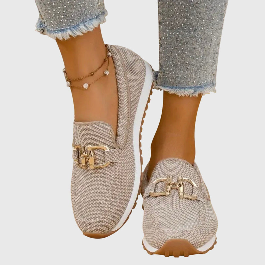Beige orthopedic loafer sneakers with gold-tone buckle ornament on the vamp