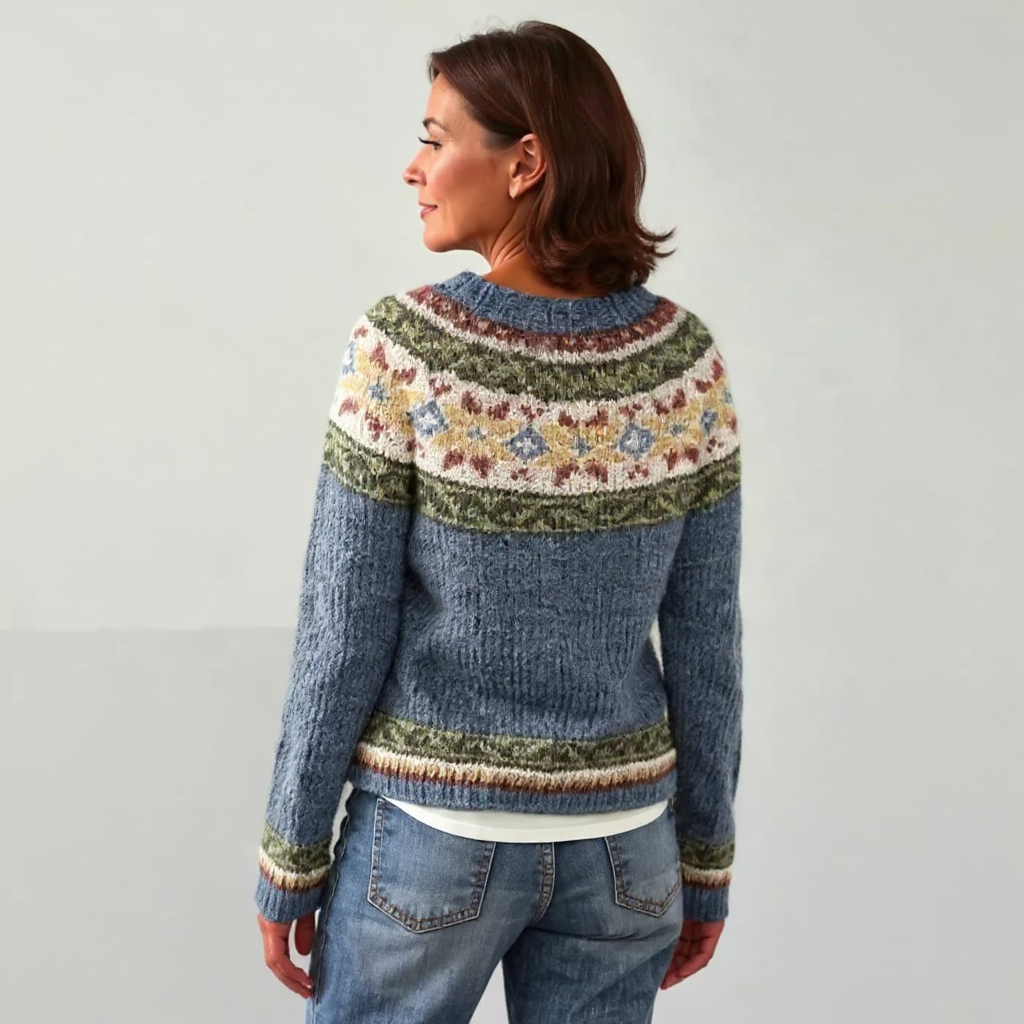 Wool crewneck sweater shown from back with multicolor yoke and striped hem band