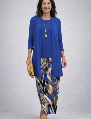 Royal blue 3-piece outfit with long cardigan, matching top, and abstract patterned trousers