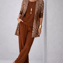 Rust brown 3-piece outfit with textured open jacket, matching blouse, and wide-leg trousers
