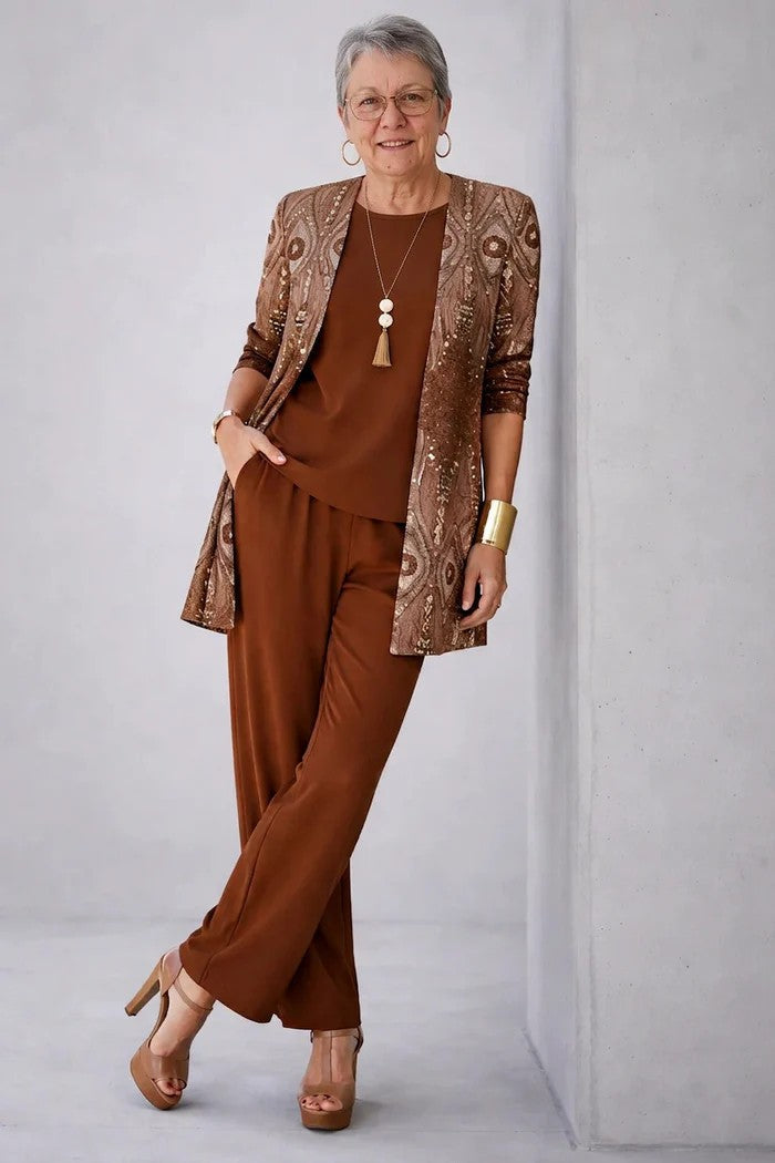 Rust brown 3-piece outfit with textured open jacket, matching blouse, and wide-leg trousers