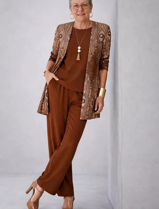 Rust brown 3-piece set with patterned jacket, matching top, and wide-leg pants