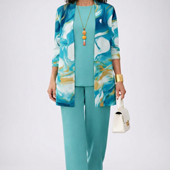 Women’s teal 3-piece set with blue abstract jacket and matching long-sleeve pants