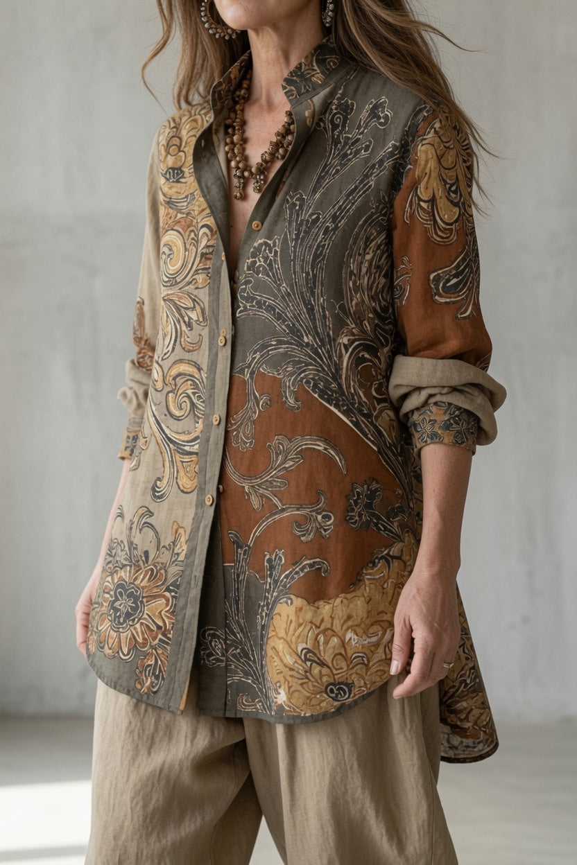 Long-sleeve paisley button-up tunic with curved hem, beige trim and dark brown print