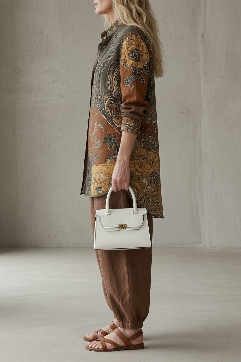 Paisley button-up tunic with three-quarter sleeves over drawstring pants, brown and beige