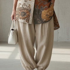 Paisley print button-up tunic with beige drawstring jogger pants, light and dark browns